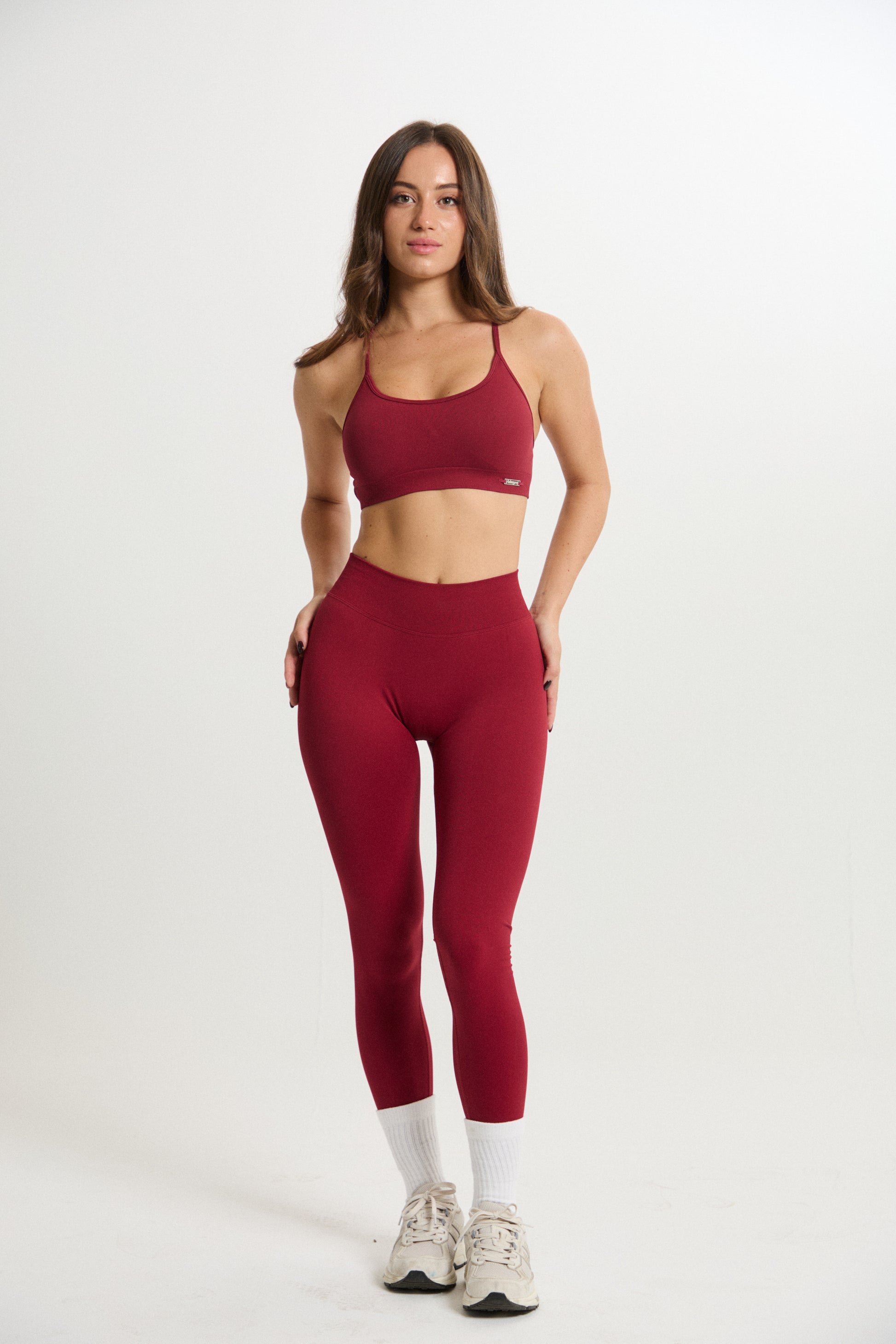 Legging Admyre Moonlight rojo de cintura alta con efecto moldeador y tejido técnico elástico para entrenamiento.