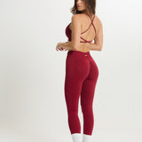 Legging Admyre Moonlight rojo de cintura alta con efecto moldeador y tejido técnico elástico para entrenamiento.