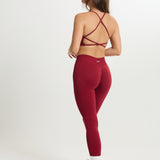 Top deportivo Admyre Moonlight rojo con diseño de sujeción media, tejido transpirable y estilo athleisure.