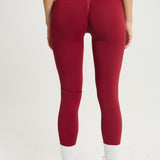 Legging Admyre Moonlight rojo de cintura alta con efecto moldeador y tejido técnico elástico para entrenamiento.