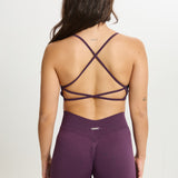 Top Admyre Moonlight morado con espalda deportiva y tejido elástico ideal para gym o yoga.