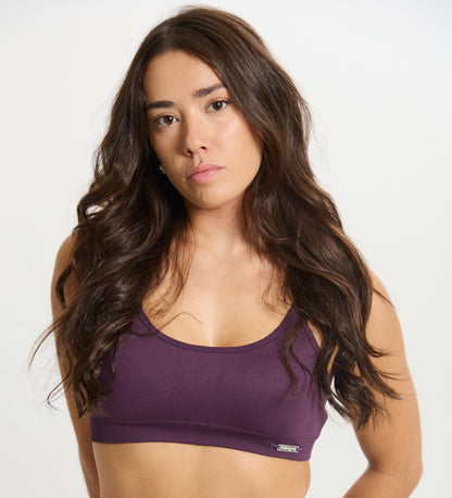 Top Admyre Moonlight morado con espalda deportiva y tejido elástico ideal para gym o yoga.