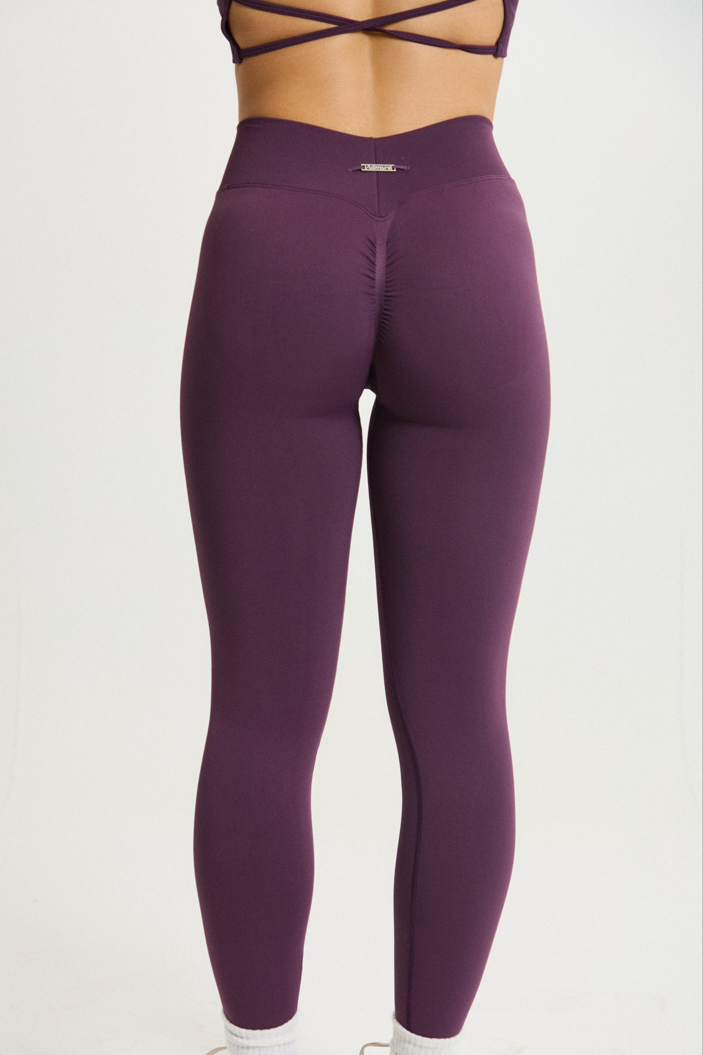 Legging Admyre Moonlight morado con compresión media y ajuste segunda piel, ideal para gym o pilates.