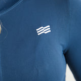 Chaqueta deportiva Admyre Moonlight azul navy con cremallera y cuello alto, diseño ajustado y tejido técnico.