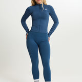 Chaqueta deportiva Admyre Moonlight azul navy con cremallera y cuello alto, diseño ajustado y tejido técnico.