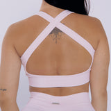 Bella Top de Admyre en baby pink: un top deportivo que combina soporte y estilo, perfecto para tus entrenamientos y días casuales