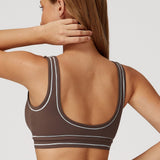 Top deportivo Impact de Admyre, diseño seamless con soporte cómodo y ajuste envolvente