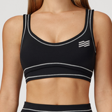 Top deportivo Impact de Admyre, diseño seamless con soporte cómodo y ajuste envolvente